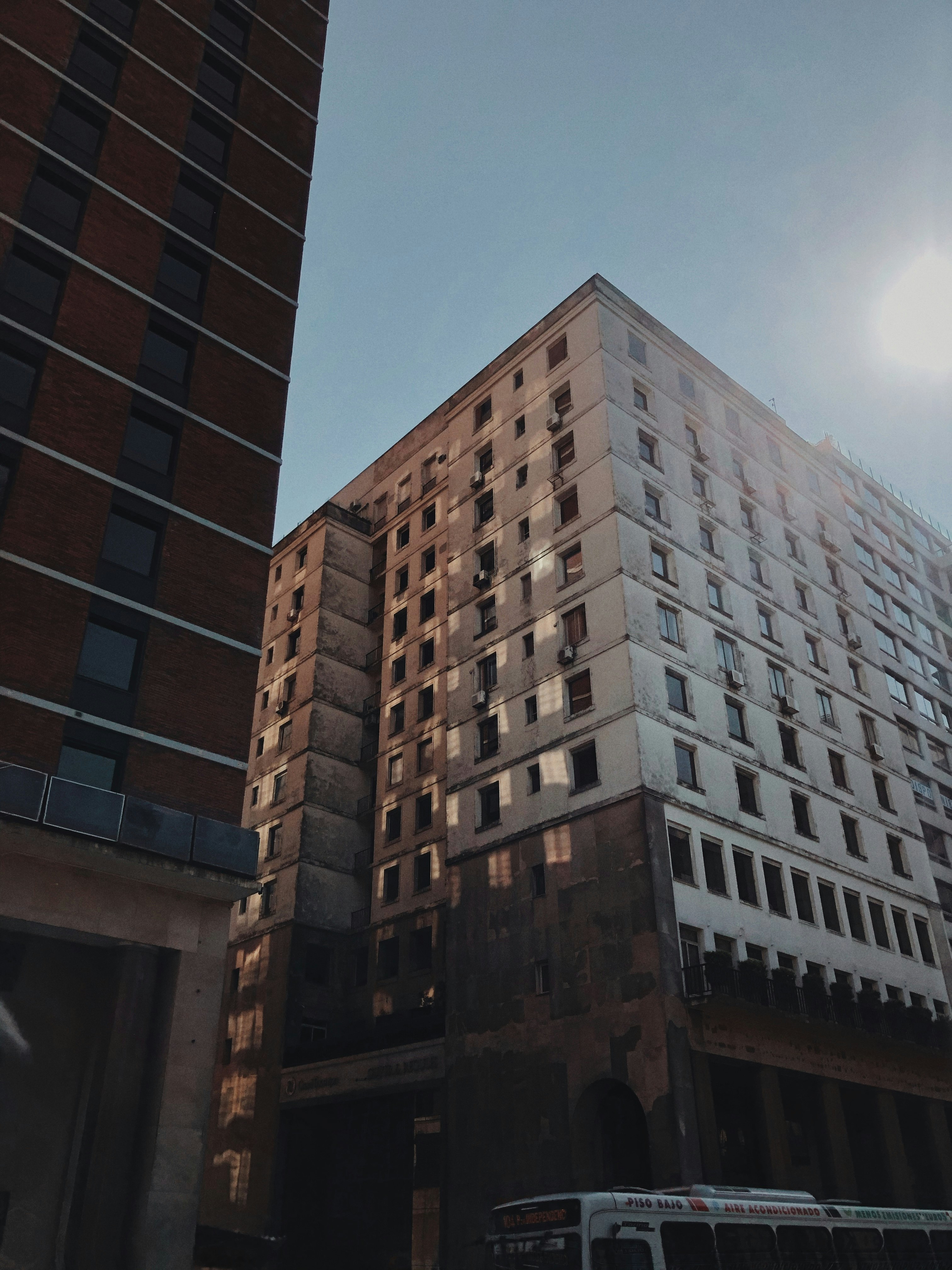 brown concrete building under blue sky during daytime